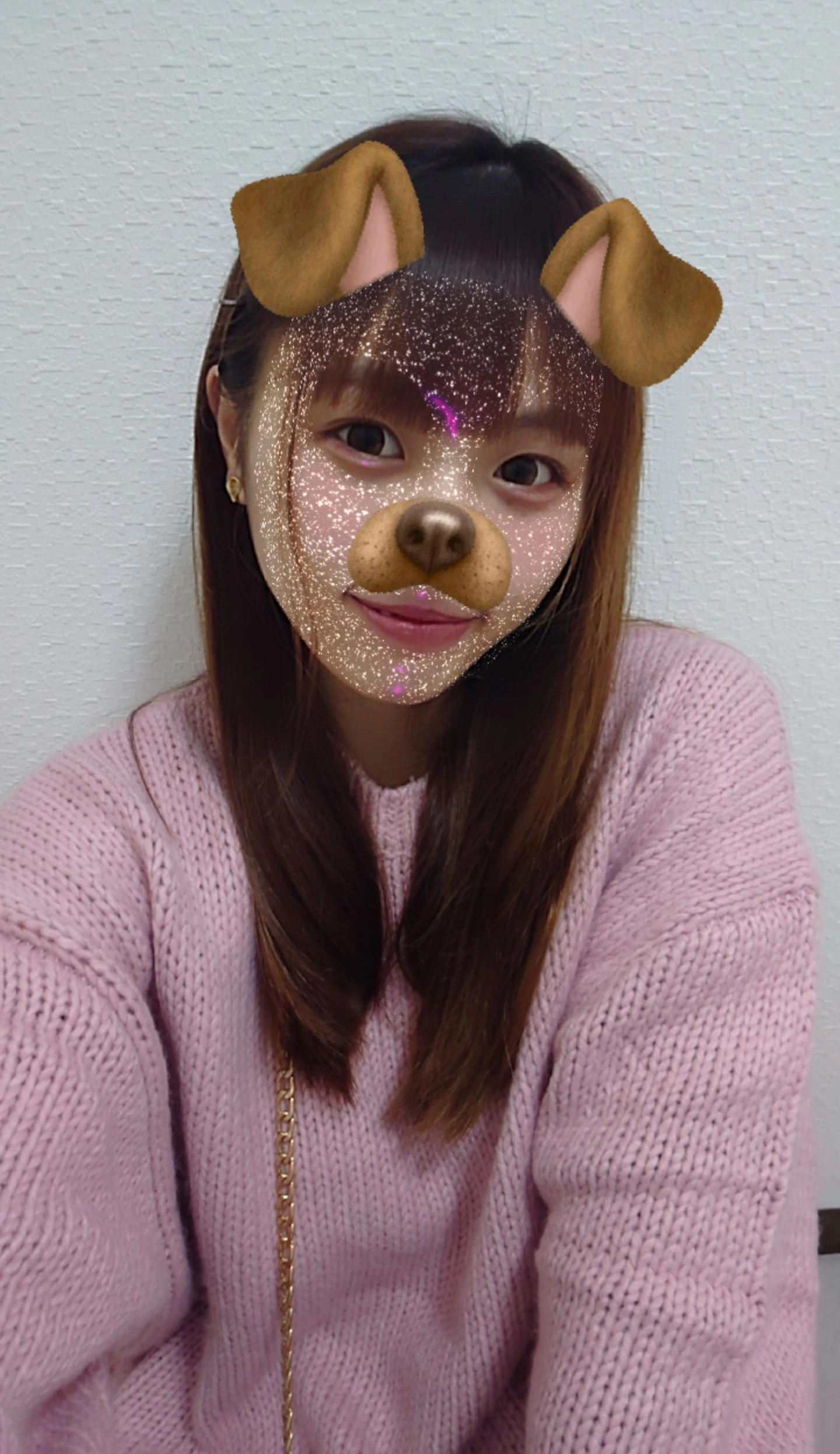 ピンクのニット?
