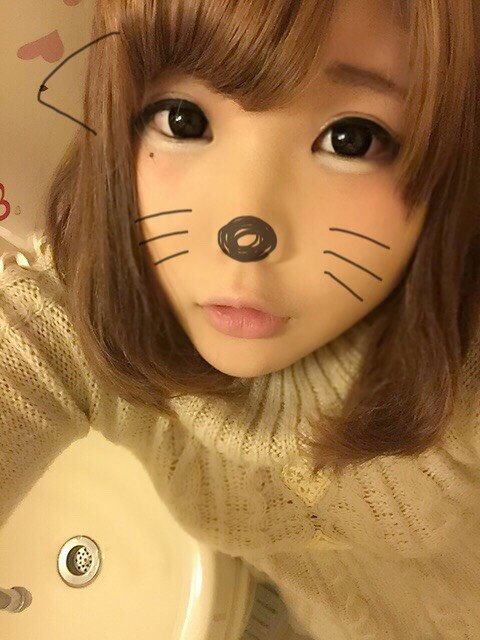にっと